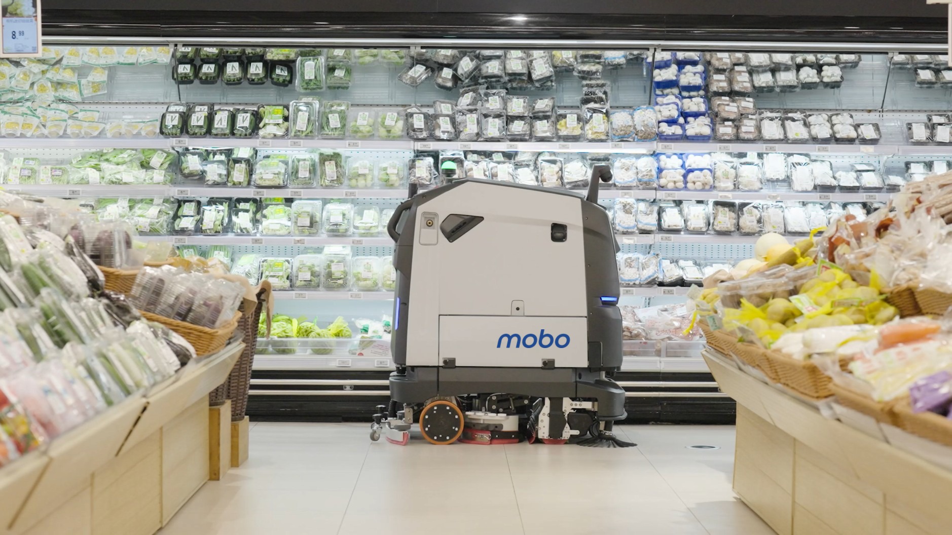 Robot de nettoyage BG1 dans un rayon de supermarché